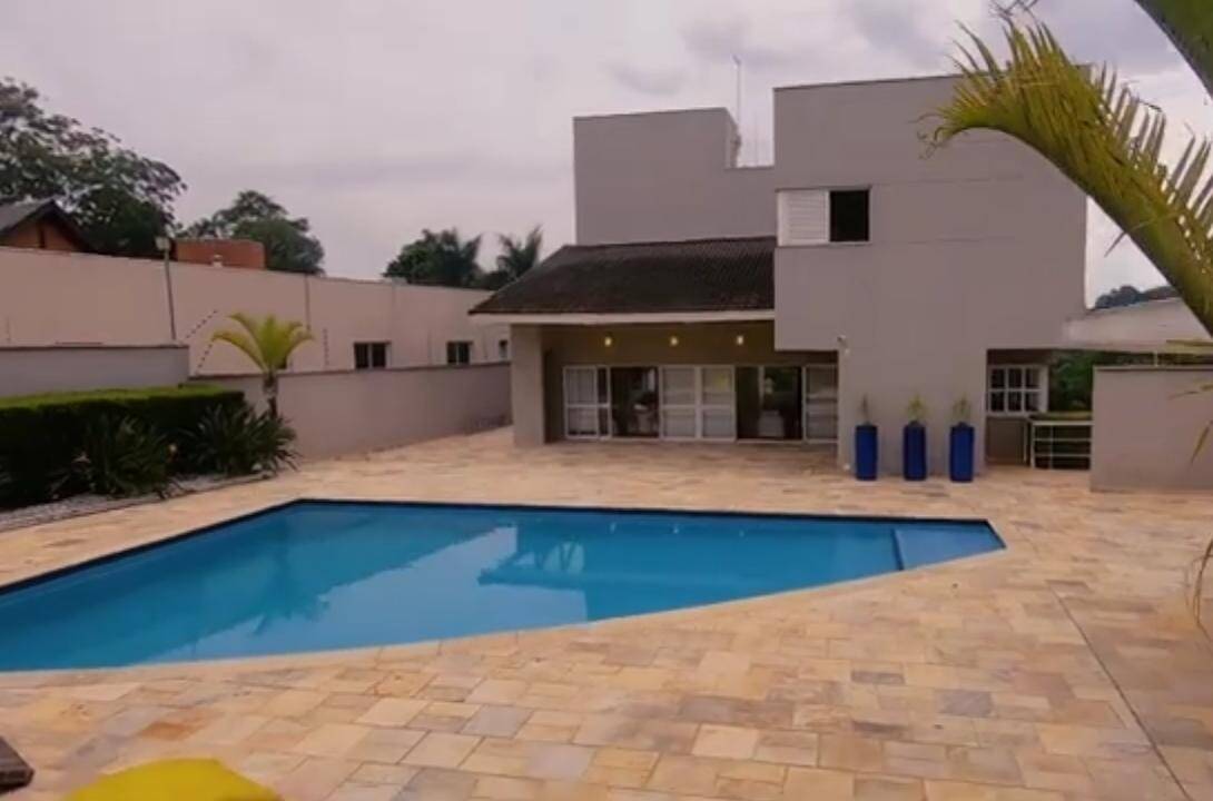 Casa de Condomínio para alugar com 3 quartos, 451m² - Foto 2