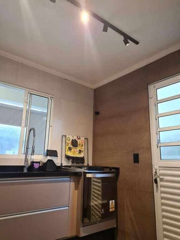 Casa à venda com 3 quartos, 97m² - Foto 11